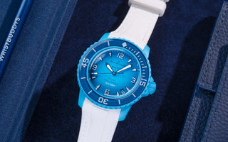 Translation missing: en.Swatch x Blancpain Scuba model with white strap on blue background featured in 2025 rumors and teaser article