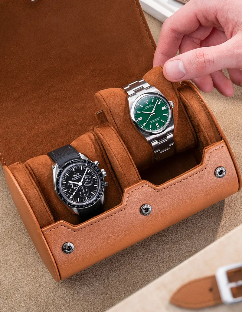 2 Slot Watch Roll in Brown displaying two luxury watches, highlighting its protective and elegant interior design.