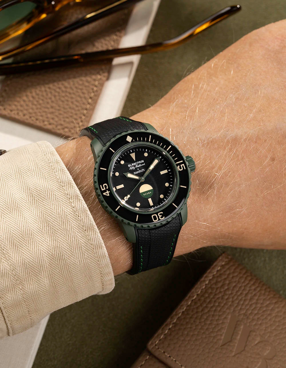Vertech Black rubber strap with green stitching on Blancpain x Swatch Green Abyss – wrist shot