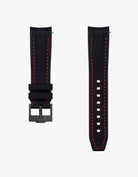 Black strap with red stitches on white background