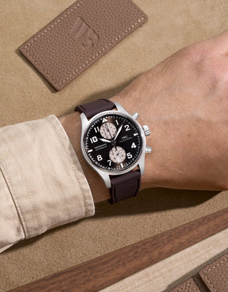 IWC watch with rubber strap on wrist – stylish and modern design