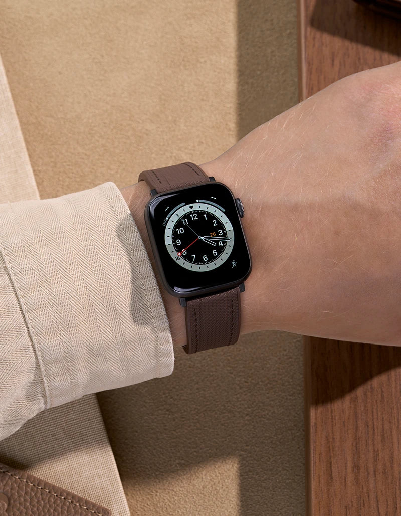 Active lifestyle wrist shot – Brown Apple Watch band with
