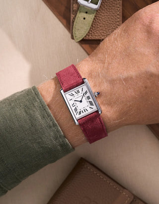 Burgundy suede strap worn with silver cartier tank watch | deep red leather variant from multi-color suede series