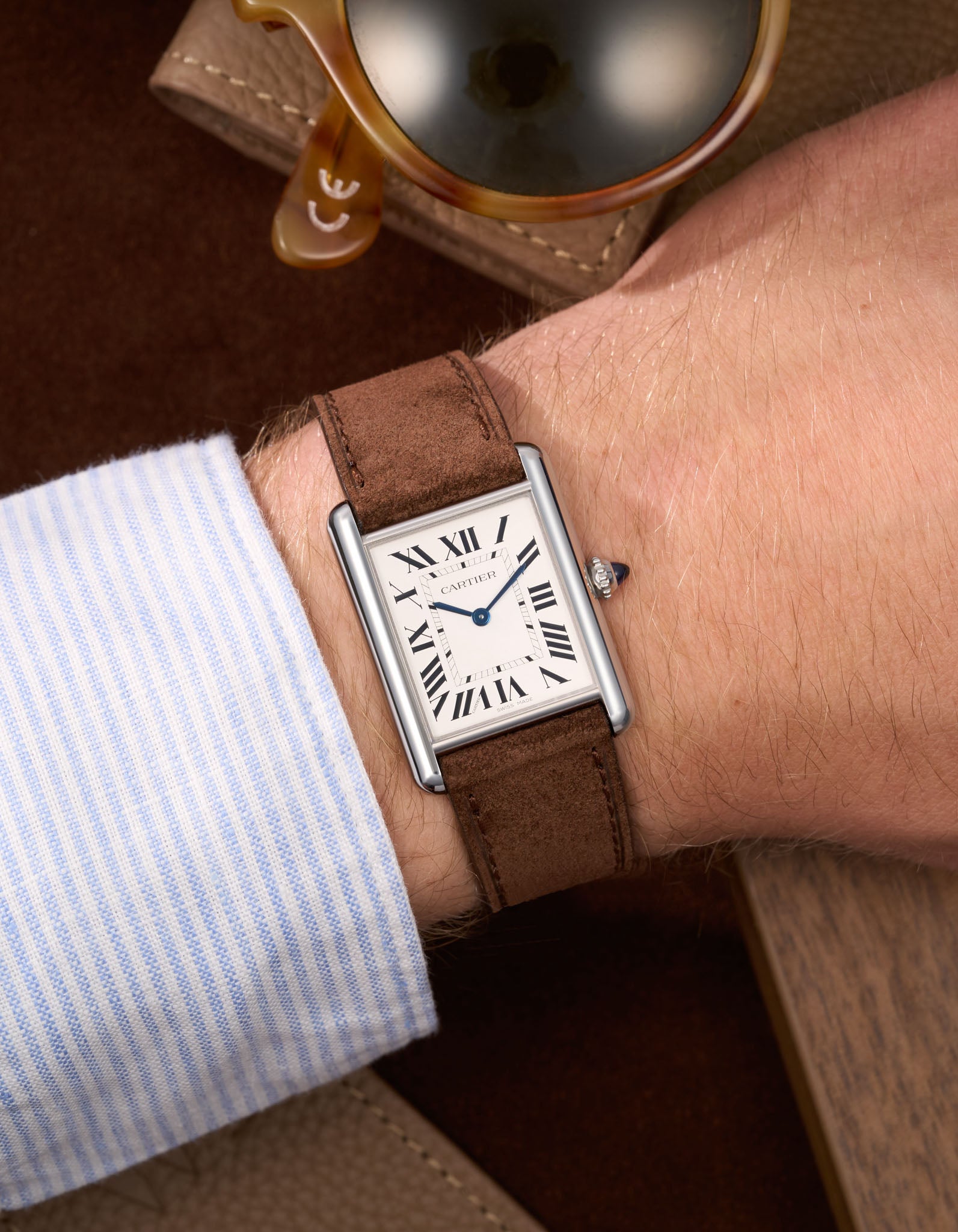 Brown Suede Leather Straps for Cartier Tank Must Large wrist shot over brown table