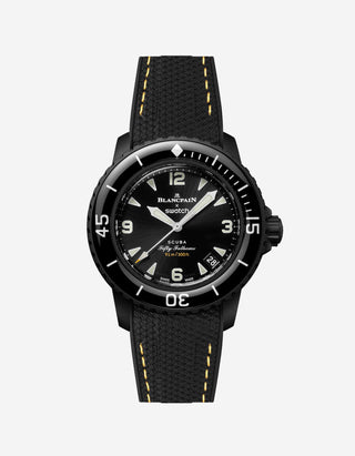 Blancpain Swatch Ocean of Storms diver watch shown from the front with black rubber strap with yellow stiches attached