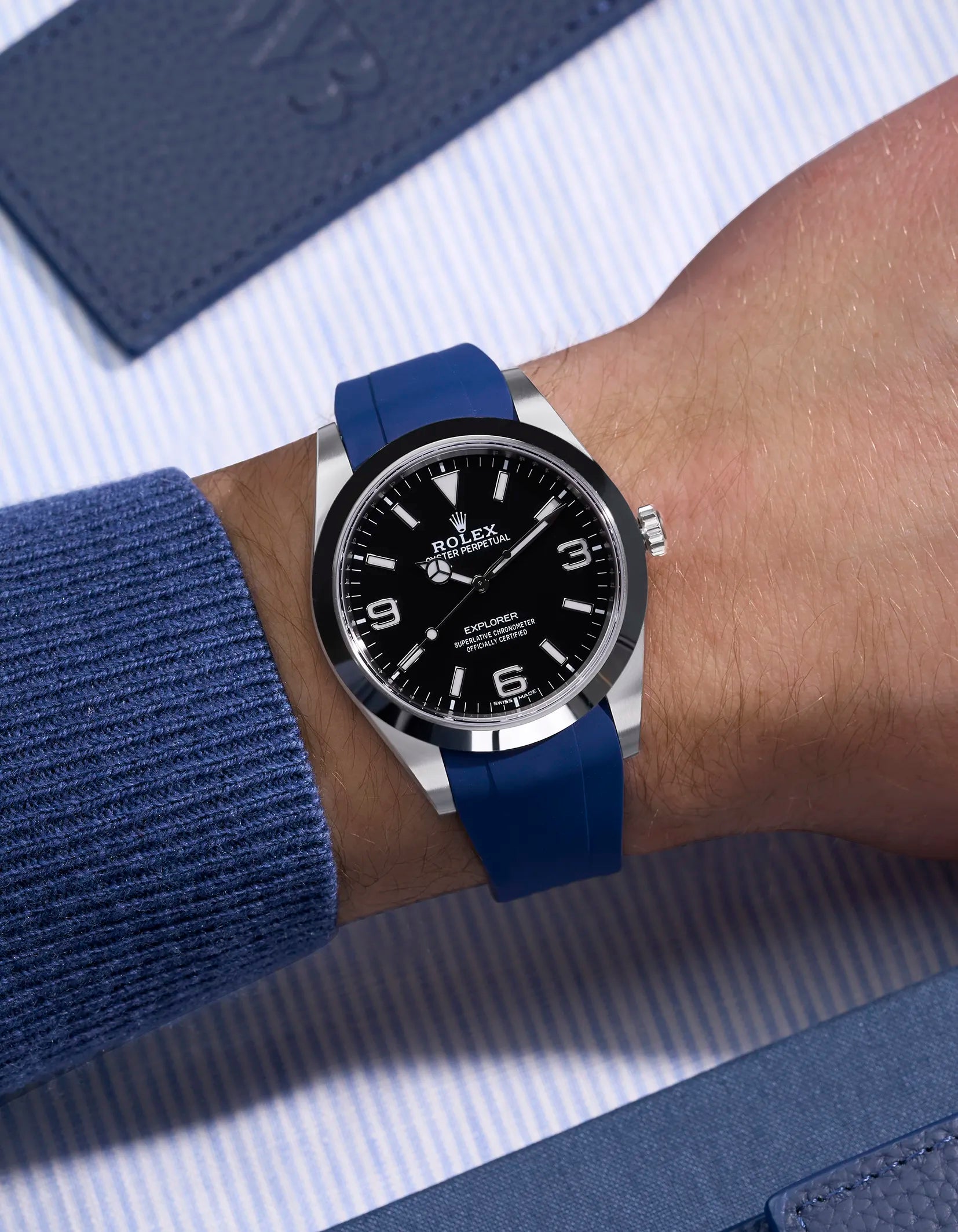 Blue rubber strap for Rolex Explorer 214270 with original clasp – wrist shot showing seamless integration