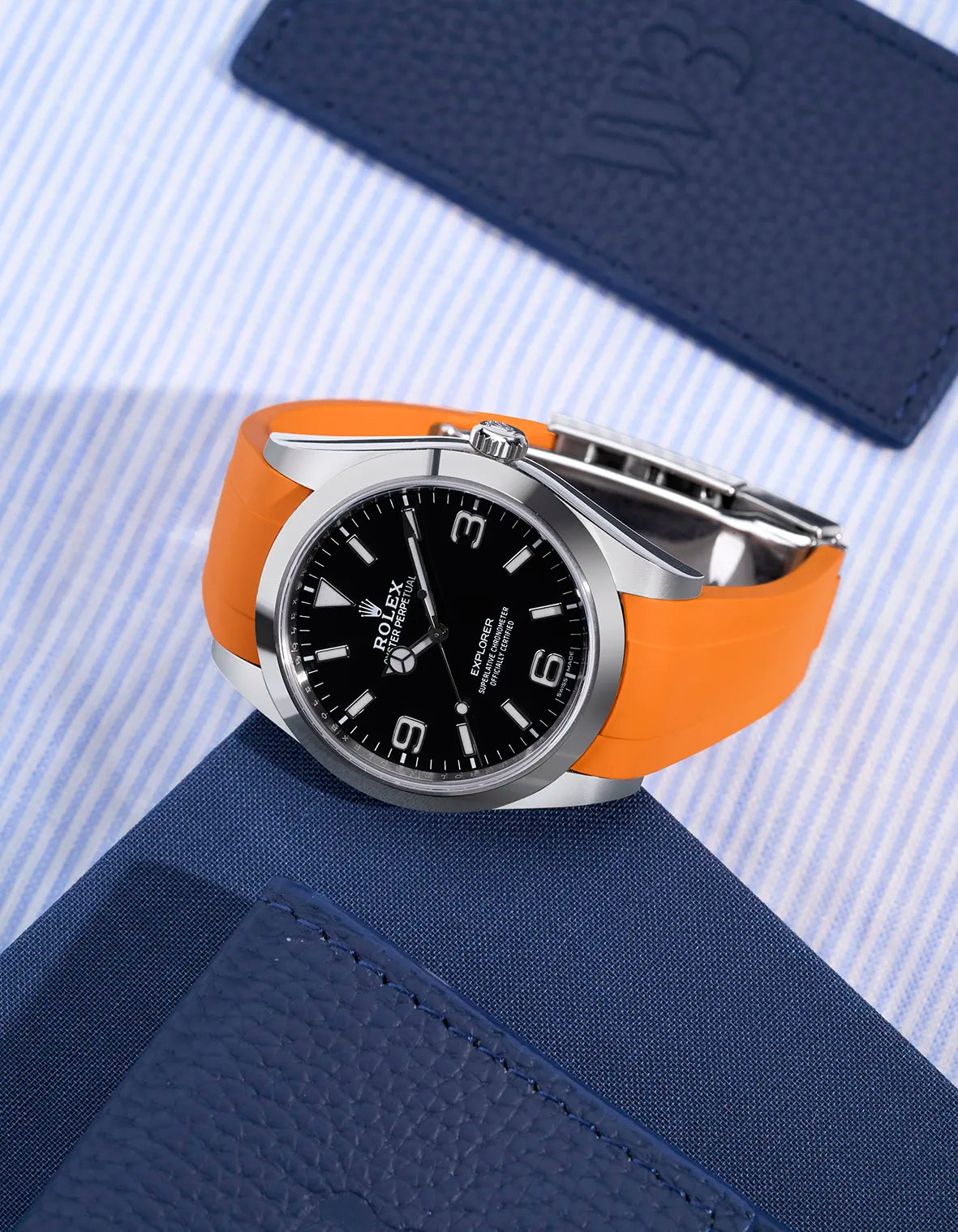 Rolex Explorer 214270 with orange FKM rubber strap and original clasp – premium integrated fit