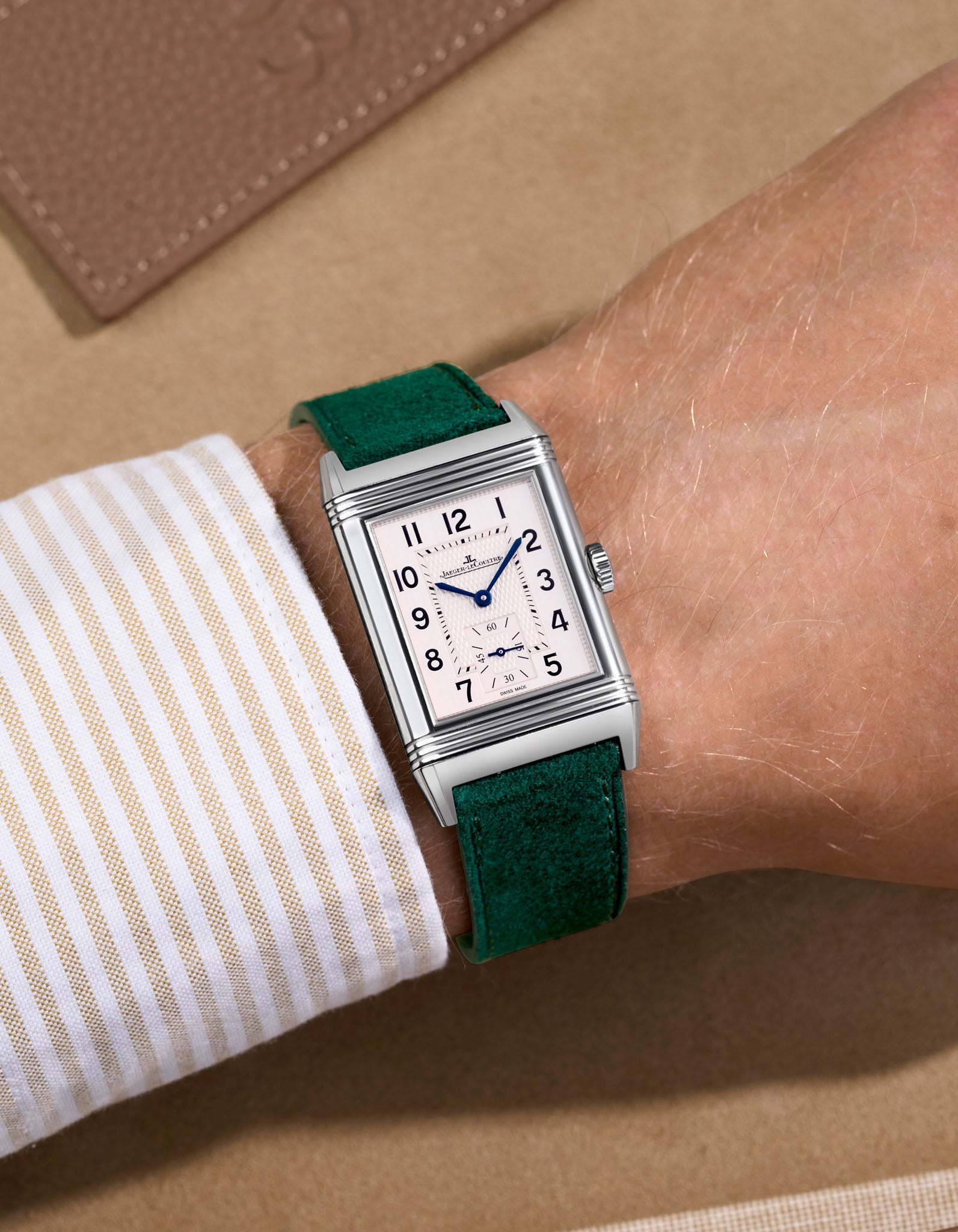 Green suede leather watch strap on a JLC Reverso steel watch. Handmade in italy in lug width 17mm to 21mm