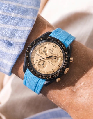 Capri Blue Rubber Strap For Omega x Swatch MoonSwatch Mission To The Moon 1969 wrist shot with stripped shirt