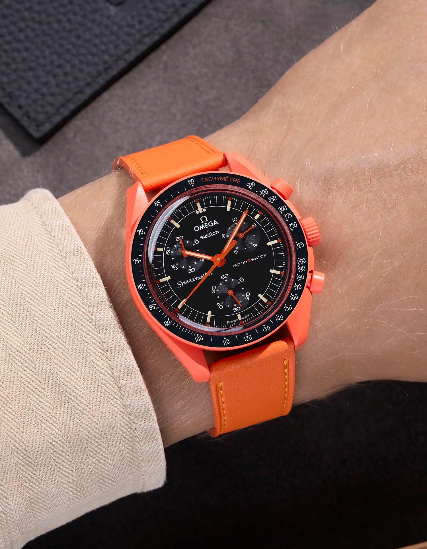 Orange Cowhide leather strap on Omega X Swatch MoonSwatch Mission on Earth Lava – wrist shot
