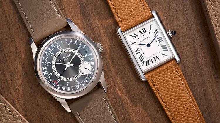 Two luxury watches fitted with Wristbuddys handcrafted leather straps in taupe and brown, highlighting the collection’s balance of elegance, craftsmanship, and comfort.