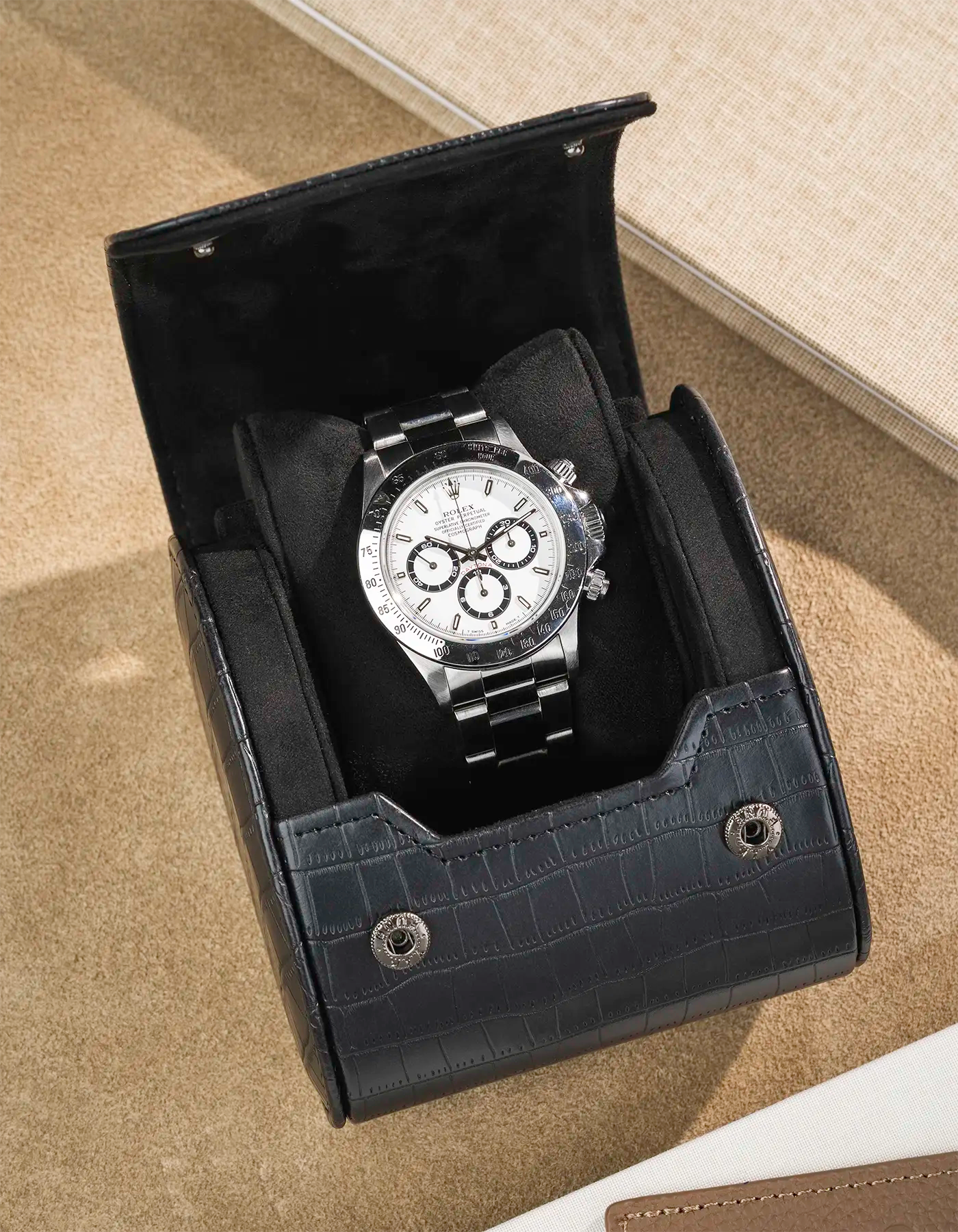 Opened Single Watch Roll  Black Embossed Alligator with a Rolex in