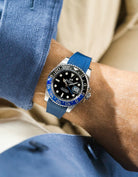 Navy Blue vertech rubber strap on Rolex 126710 batman wrist shot with blue shirt