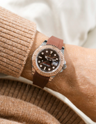 Close-up of a person wearing a Rolex YachtMaster 2 126622 / 116622 model watch with a brown shirt sleeve and a brown FKM rubber watch strap from Wristbuddys