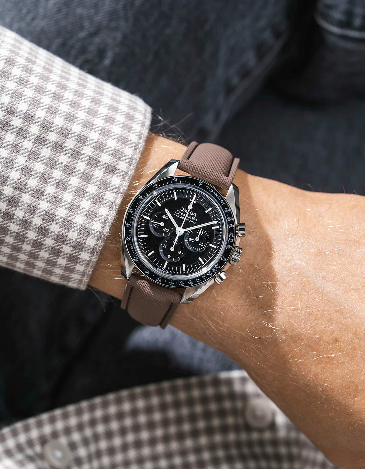 Brown Sailcloth FKM Rubber Strap With Deployant Clasp wrist shot on Omega Speedmaster watch
