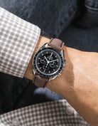 Brown Sailcloth FKM Rubber Strap With Deployant Clasp wrist shot on Omega Speedmaster watch