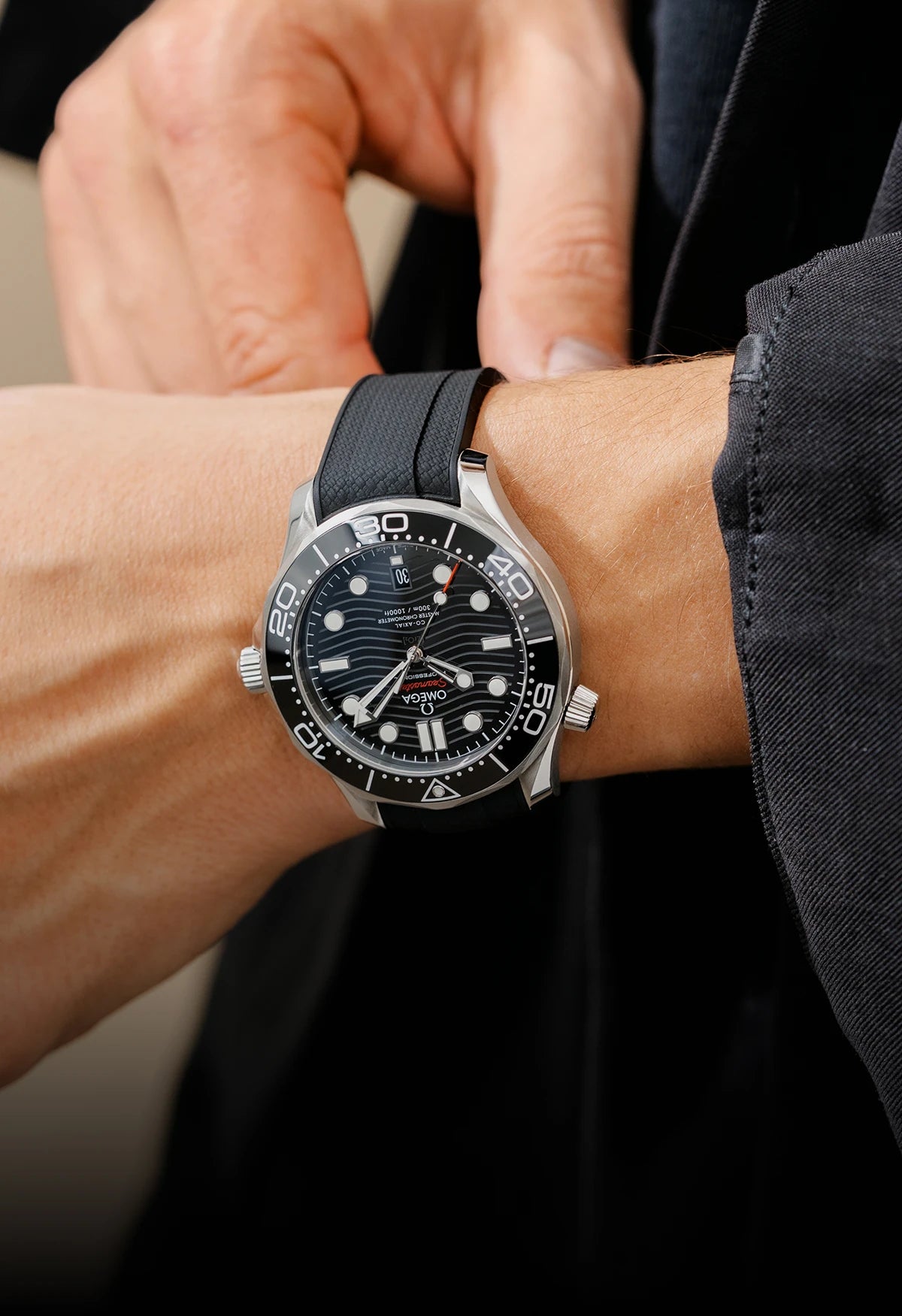 environmental image on our black rubber strap with an omega