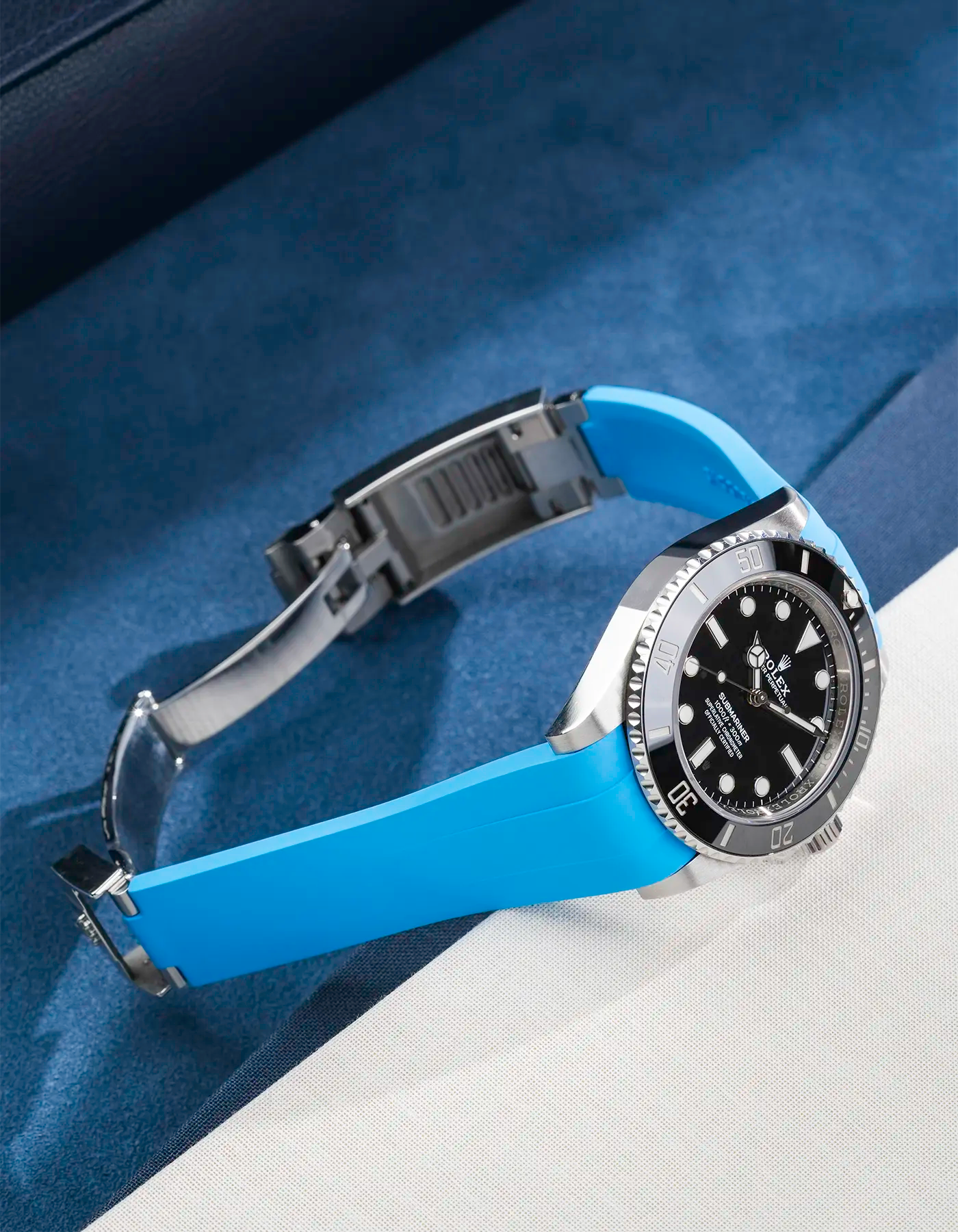 Capri Blue Classic Smooth FKM Rubber Strap fitted on Rolex Submariner 41 ref. 126610LN/124060LN, mounted on the watch with clasp open – product photo from the side