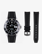Rolex watch with black dial and rubber vertech strap on a white background togheter