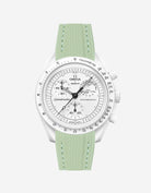 Omega X Swatch MoonSwatch Mission to the MoonPhase on a mint green vertech rubber watch strap with a white background showcasing both the watch and the watch strap from Wristbuddys