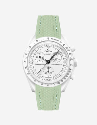Omega X Swatch MoonSwatch Mission to the MoonPhase on a mint green vertech rubber watch strap with a white background showcasing both the watch and the watch strap from Wristbuddys