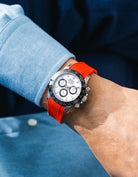 Vertech Red integrated FKM rubber strap with original clasp on Rolex Daytona 116500 white dial ceramic bezel wrist shot