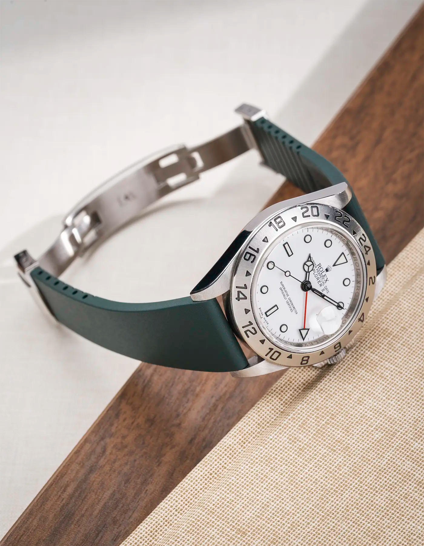 Green CTS FKM Rubber Strap 19-22mm lying flat and showing the clasp open