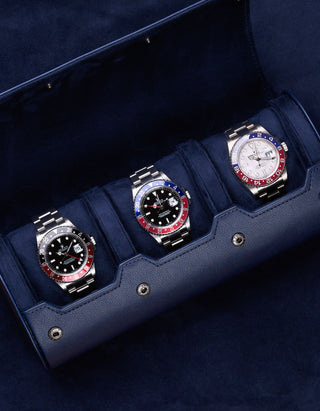 Opened 3 Slot Watch Roll in navy blue with 3 different Rolex watches inside