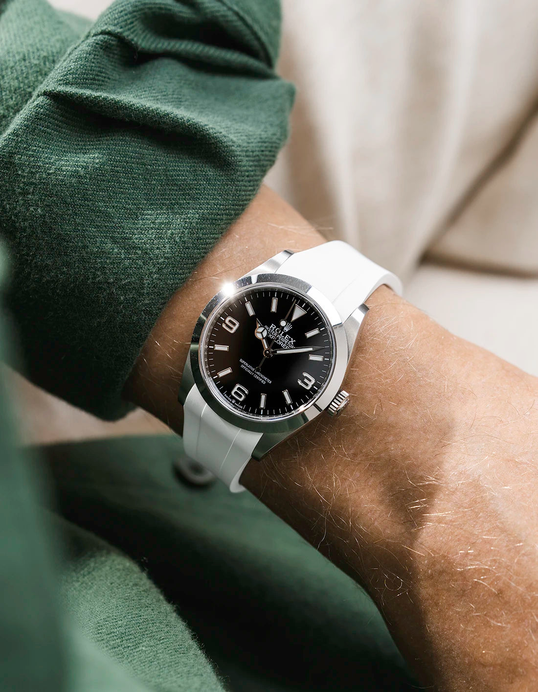 White integrated FKM rubber strap with original clasp on Rolex Explorer 40 224270 black dial wrist shot