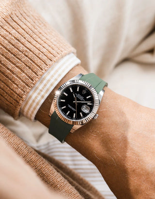 Green integrated FKM rubber strap with original clasp on Rolex Datejust 41 126334 fluted bezel black dial wrist shot