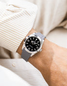 Grey integrated FKM rubber strap with original clasp on Rolex Explorer 40 224270 black dial wrist shot