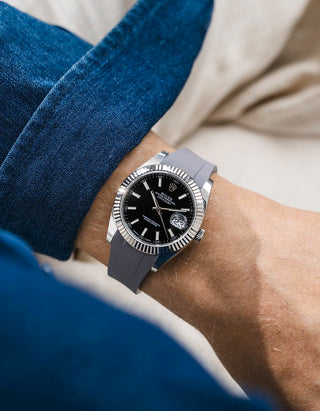 Grey integrated FKM rubber strap with original clasp on Rolex Datejust 41 126334 fluted bezel black dial wrist shot