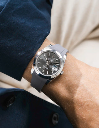 Grey integrated FKM rubber strap with original clasp on Rolex Datejust 41 126300 smooth bezel grey dial wrist shot