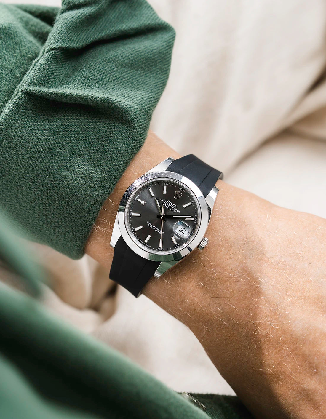 Black integrated FKM rubber strap with original clasp on Rolex Datejust 41 126300 smooth bezel grey dial wrist shot