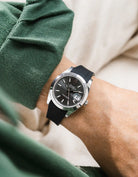 Black integrated FKM rubber strap with original clasp on Rolex Datejust 41 126300 smooth bezel grey dial wrist shot