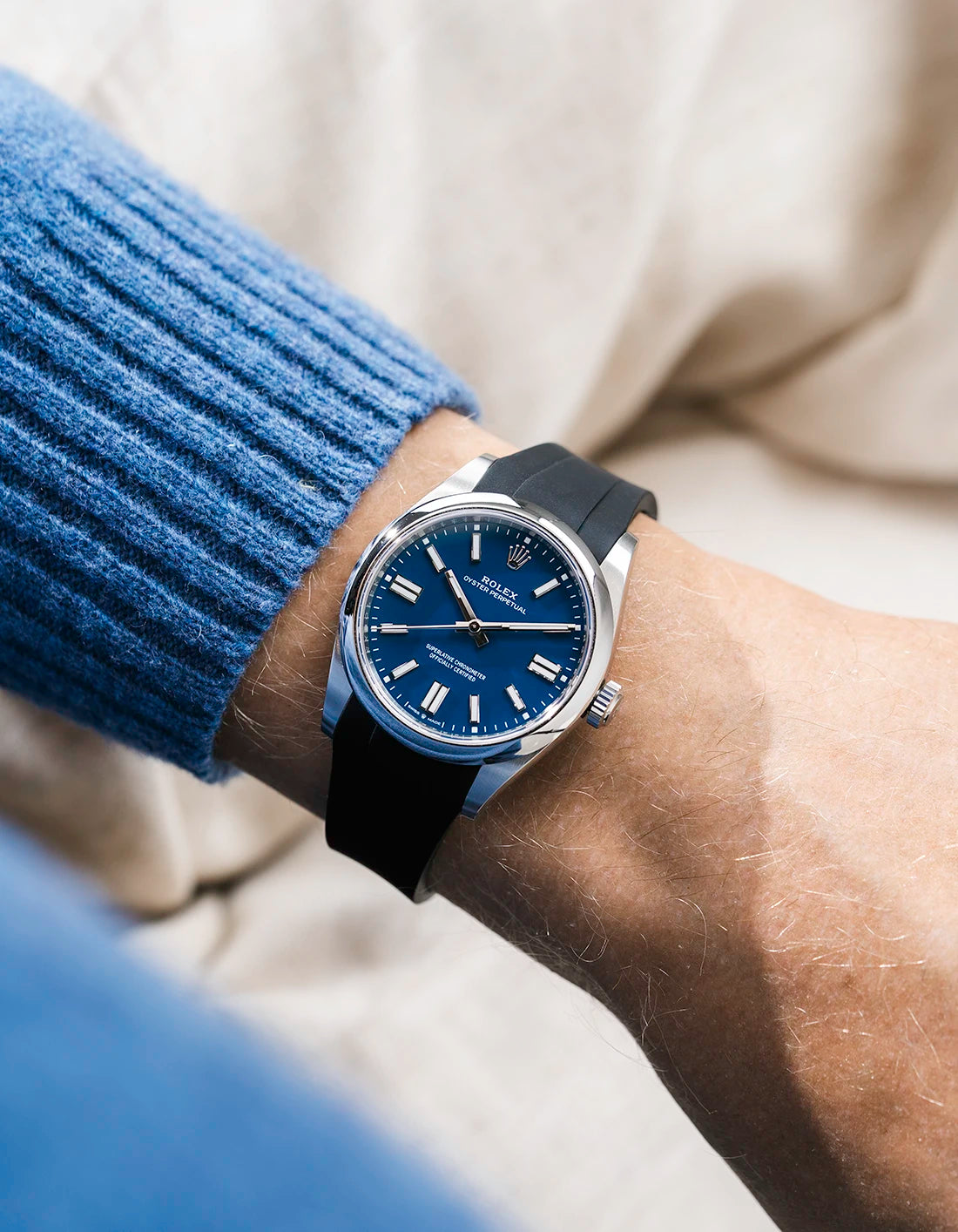 Black integrated FKM rubber strap with original clasp on Rolex Oyster Perpetual 41 134300 blue dial wrist shot