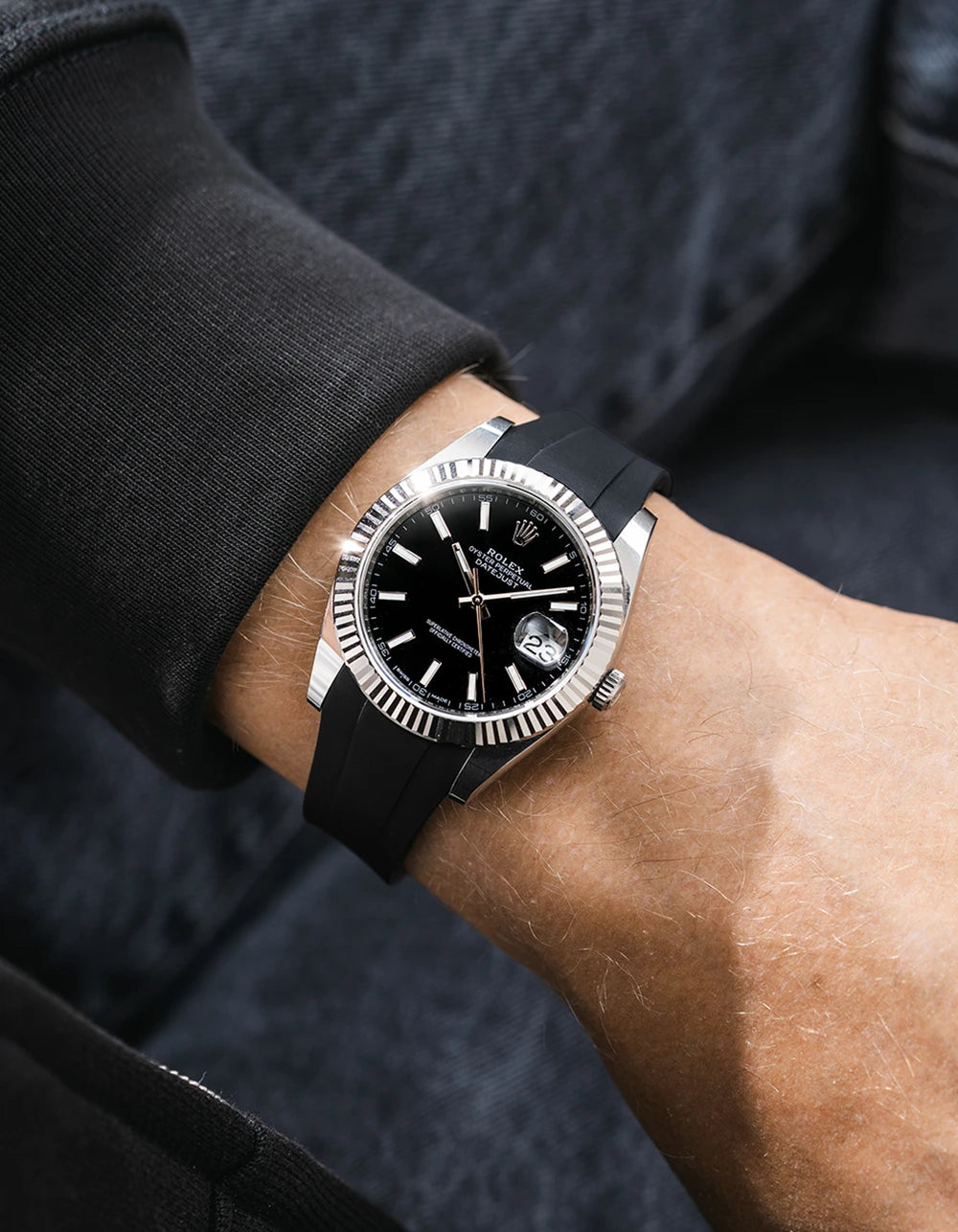 Black integrated FKM rubber strap with original clasp on Rolex Datejust 41 126334 fluted bezel black dial wrist shot