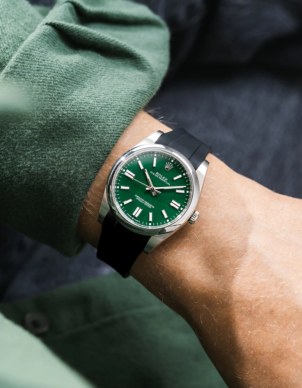 Black integrated FKM rubber strap with original clasp on Rolex Oyster Perpetual 41 124300 green dial wrist shot