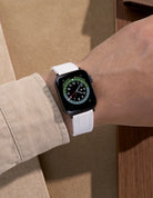 Close-up of an Apple Watch with a durable rubber band on wrist