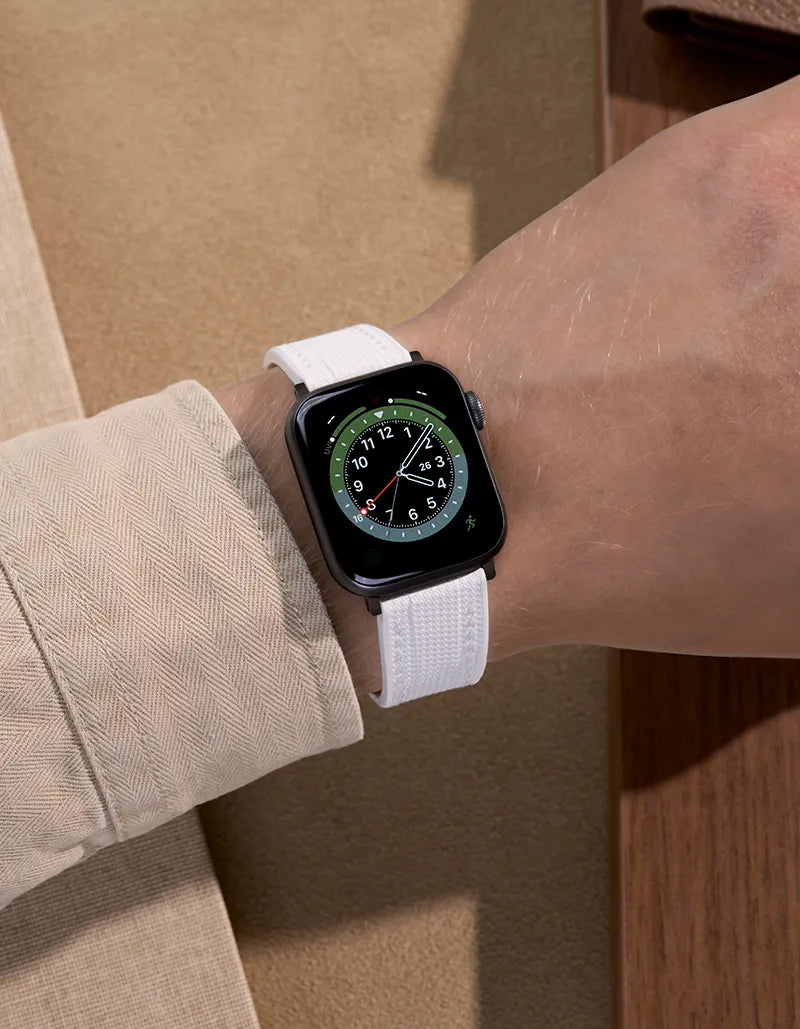 White rubber apple watch band on wrist
