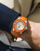 Arctic Red Rubber Strap on Blancpain X Swatch Arctic Ocean wrist shot with blue shirt