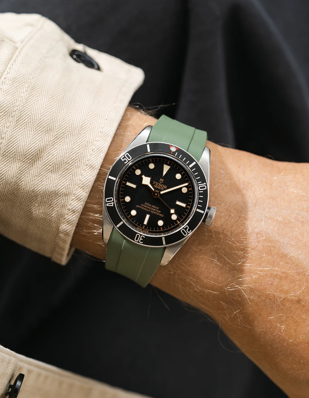 green FKM rubber watch strap from Wristbuddys with a Tudor BB41 Heritage black dial on a person's wrist