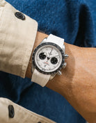 white FKM rubber watch strap from Wristbuddys with a Tudor Chrono white dial on a person's wrist