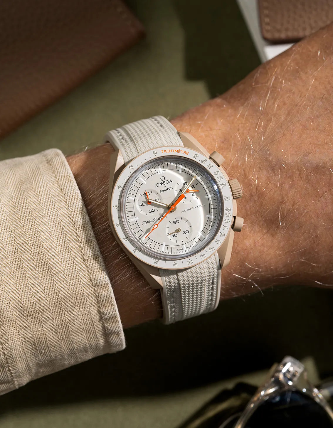 Beige curved vertech rubber strap for MoonSwatch – photographed on Mission to Jupiter