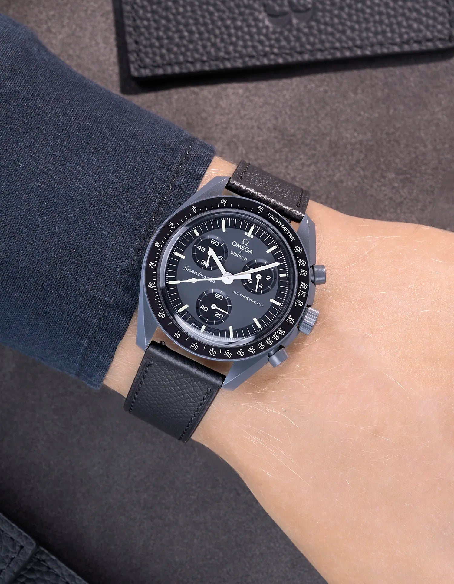 Black Epsom leather strap on Omega X Swatch MoonSwatch Mission to Mercury - worn on wrist