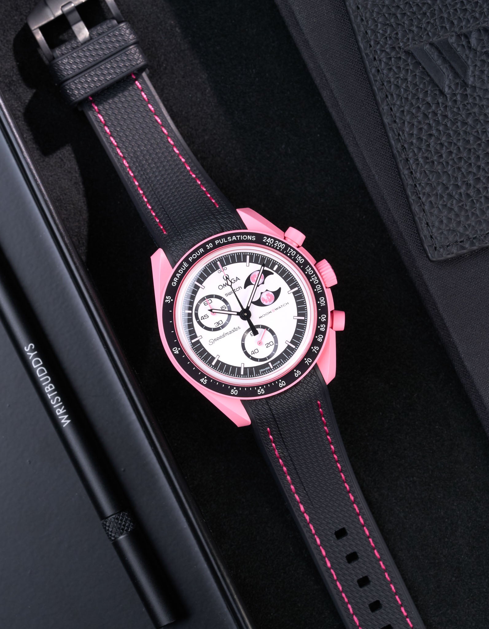 Black rubber strap on Omega x Swatch MoonSwatch Mission to the Pink Moonphase