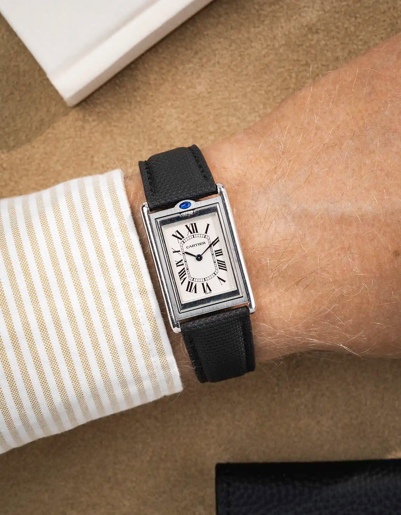 Black rubber sailcloth leather strap on Cartier Tank Louis with white dial – classic and versatile pairing