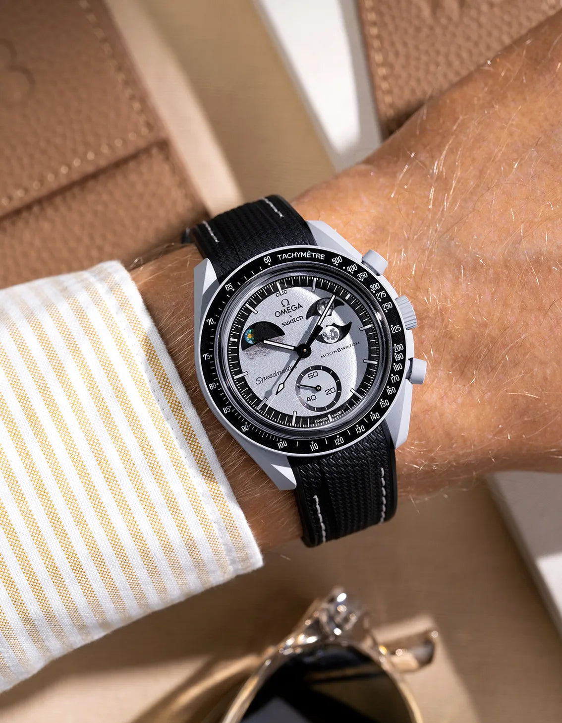 Black rubber strap with white stitches for Omega X Swatch MoonSwatch Mission to the EarthPhase – wrist shot