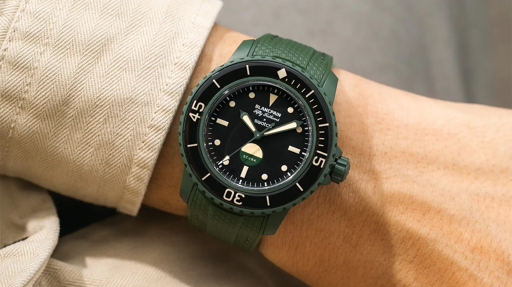 Straps for Blancpain X Swatch watches shown on Fifty Fathoms model with green rubber strap