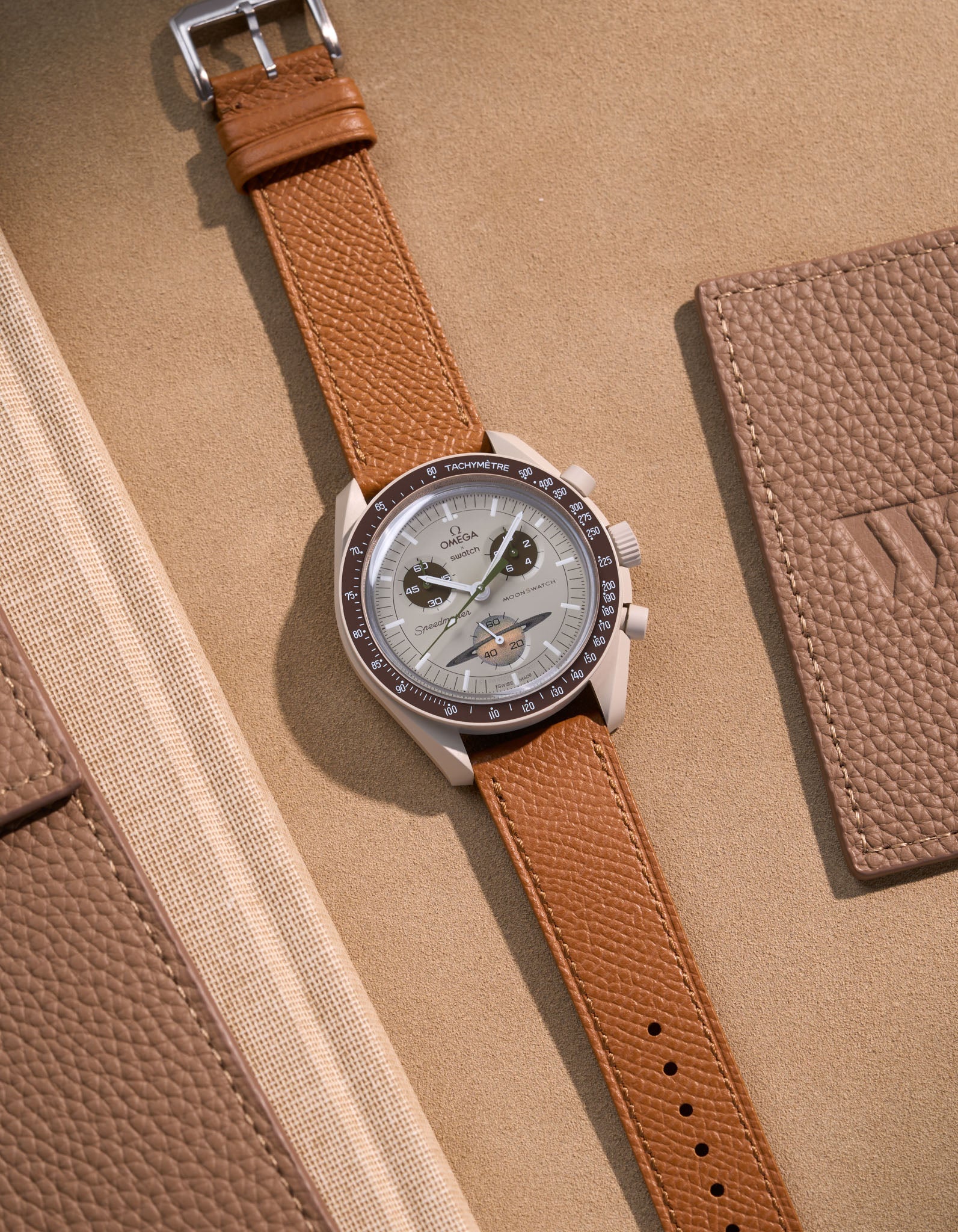 Flat lay of Brown Epsom leather strap for Omega x Swatch MoonSwatch Saturn